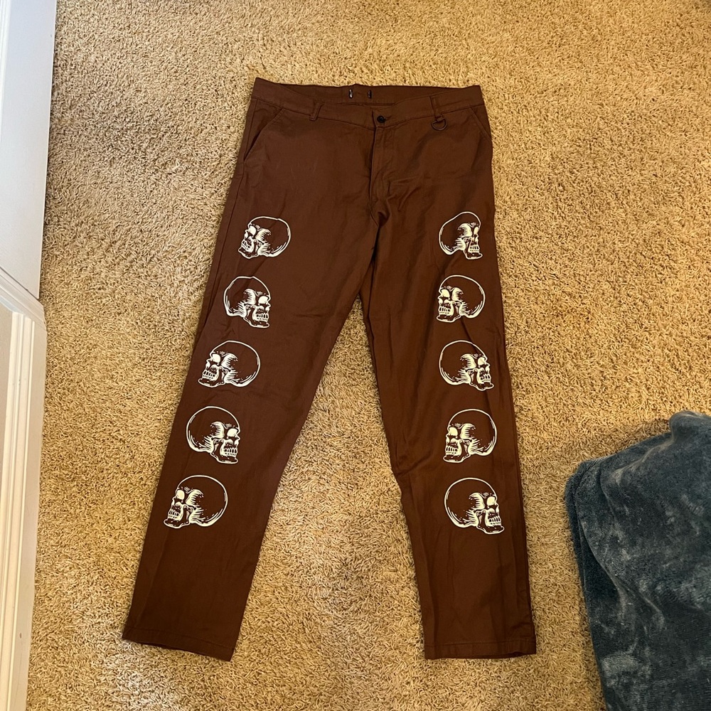 Brown thrifted pant with custom skull print